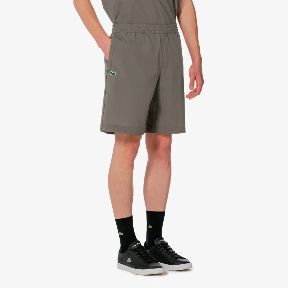 Мужские теннисные шорты цвета хаки от Lacoste — фото 2