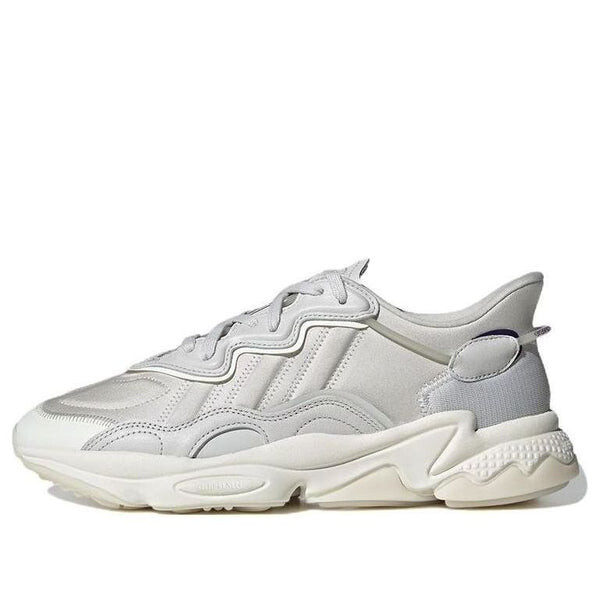 

Кроссовки оригиналы ozweego Adidas, серый