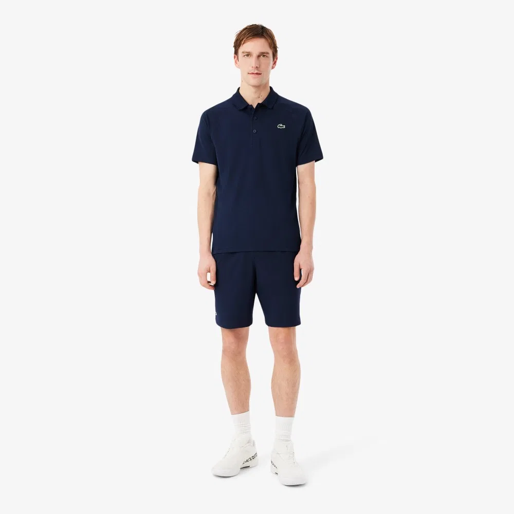 Мужские базовые тканые тренировочные шорты тёмно-синие от Lacoste