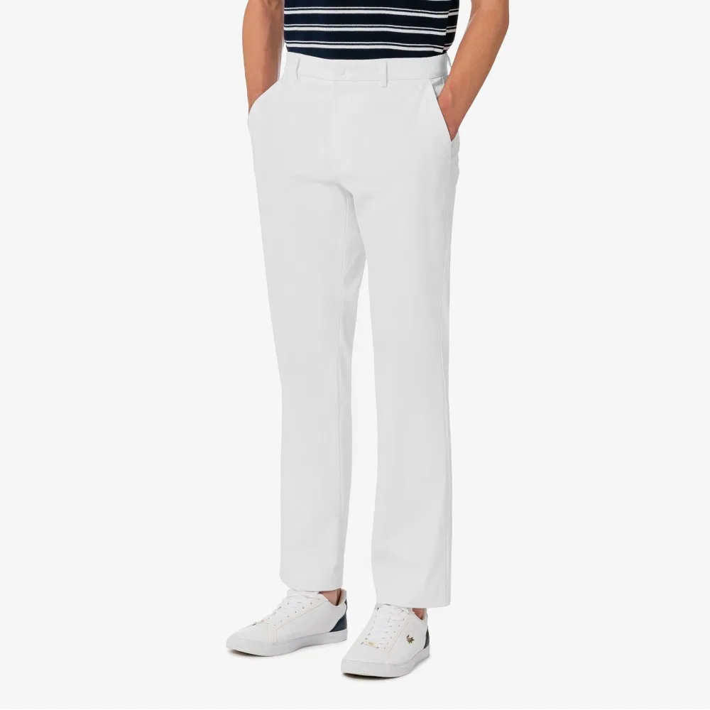 Мужские весенние эластичные брюки цвета офф-вайт от Lacoste — фото 2
