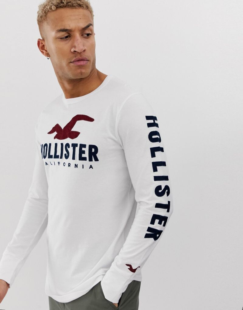 

Белый топ с длинными рукавами и логотипом Hollister