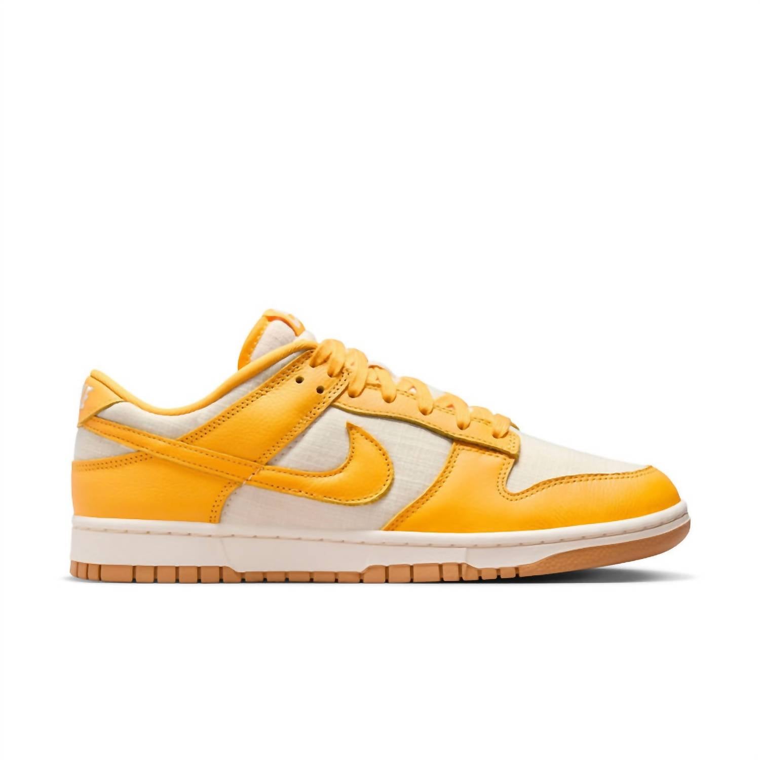 

Мужские кроссовки Dunk Low Retro Premium в цвете University Gold/Coconut Milk/Gum Light Brown Nike