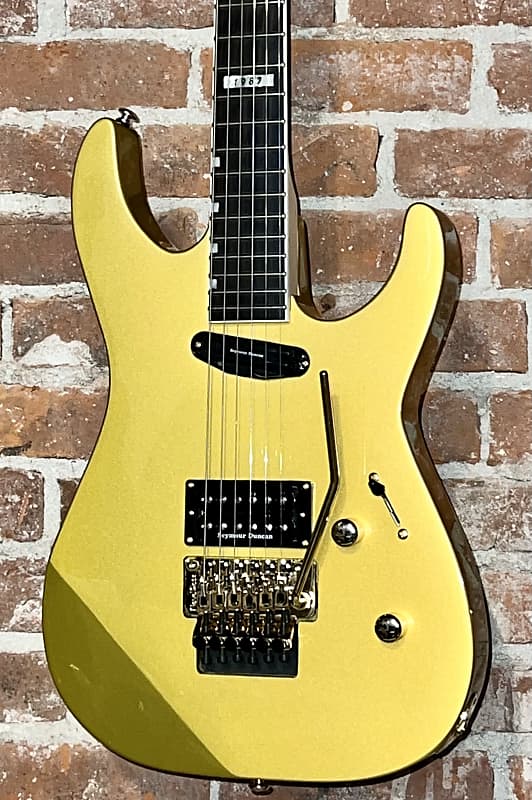 

Электрогитара 2023 ESP LTD Mirage Deluxe '87 Metallic Gold , Pro Setup ESP & Hard Shell Best Deal on the Planet !