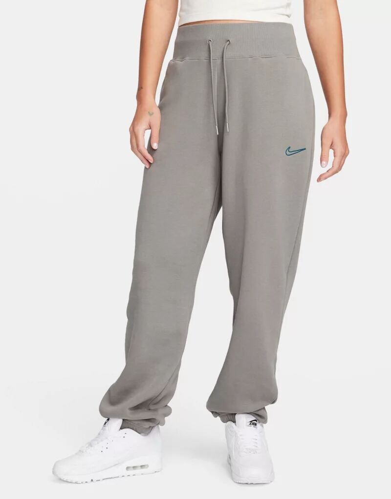 

Темно-серые джоггеры унисекс Nike Midi Swoosh