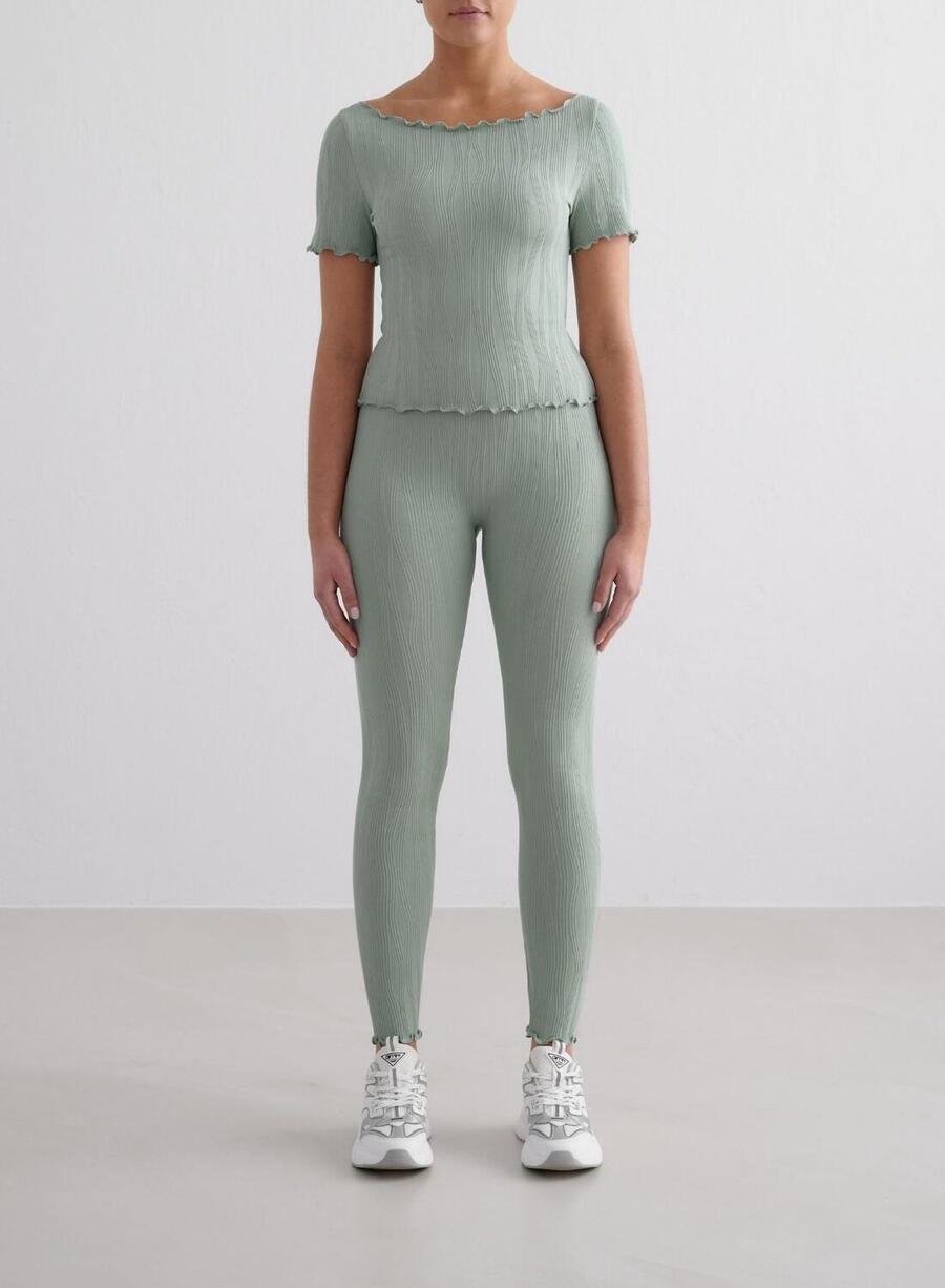 

AIM'N Женские текстурированные влагоотводящие леггинсы бледно-бирюзового цвета