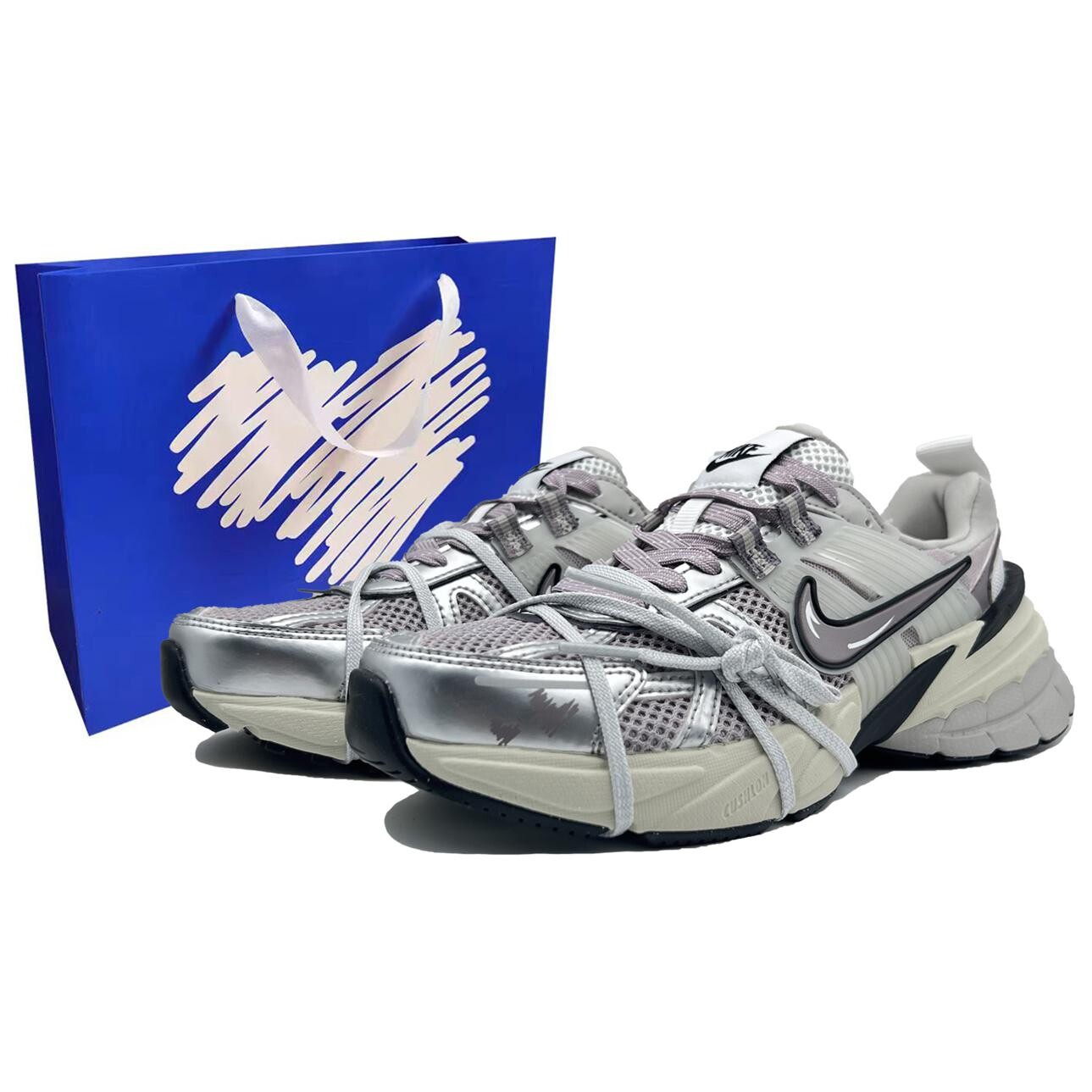 

Кроссовки для бега V2K Run женские с низким верхом сиреневые Nike