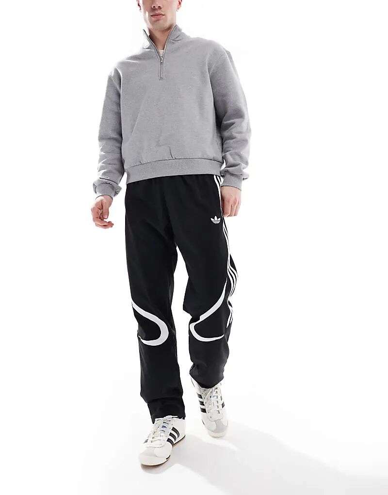 

Спортивные штаны Adicolor Teamgeist черного цвета adidas Originals