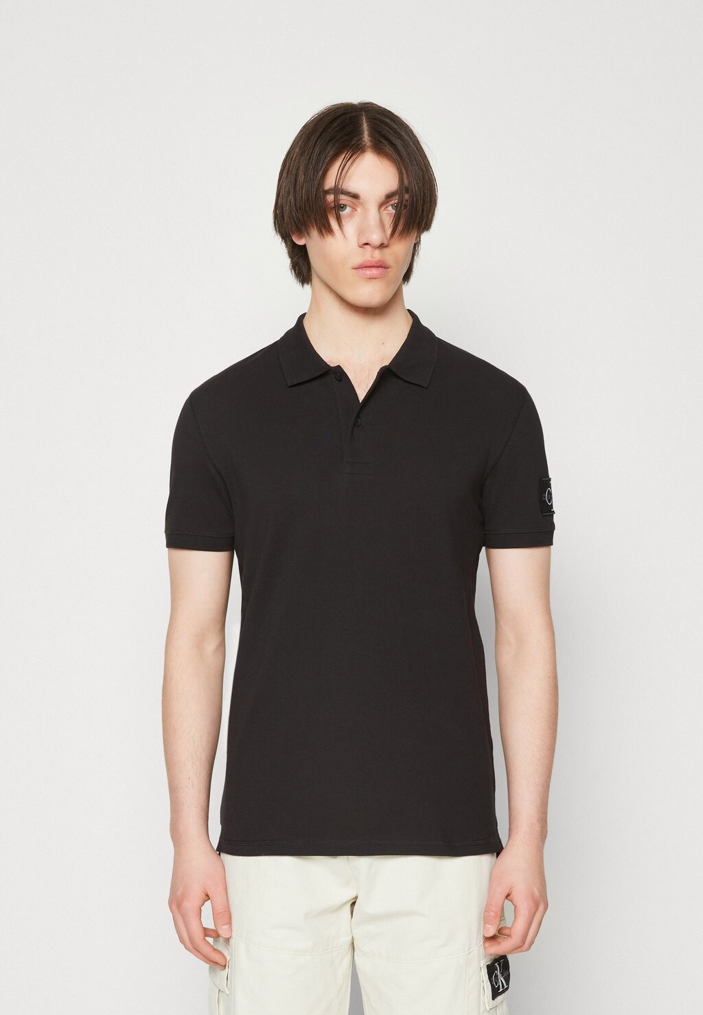 

Поло Badge Calvin Klein Jeans, черный