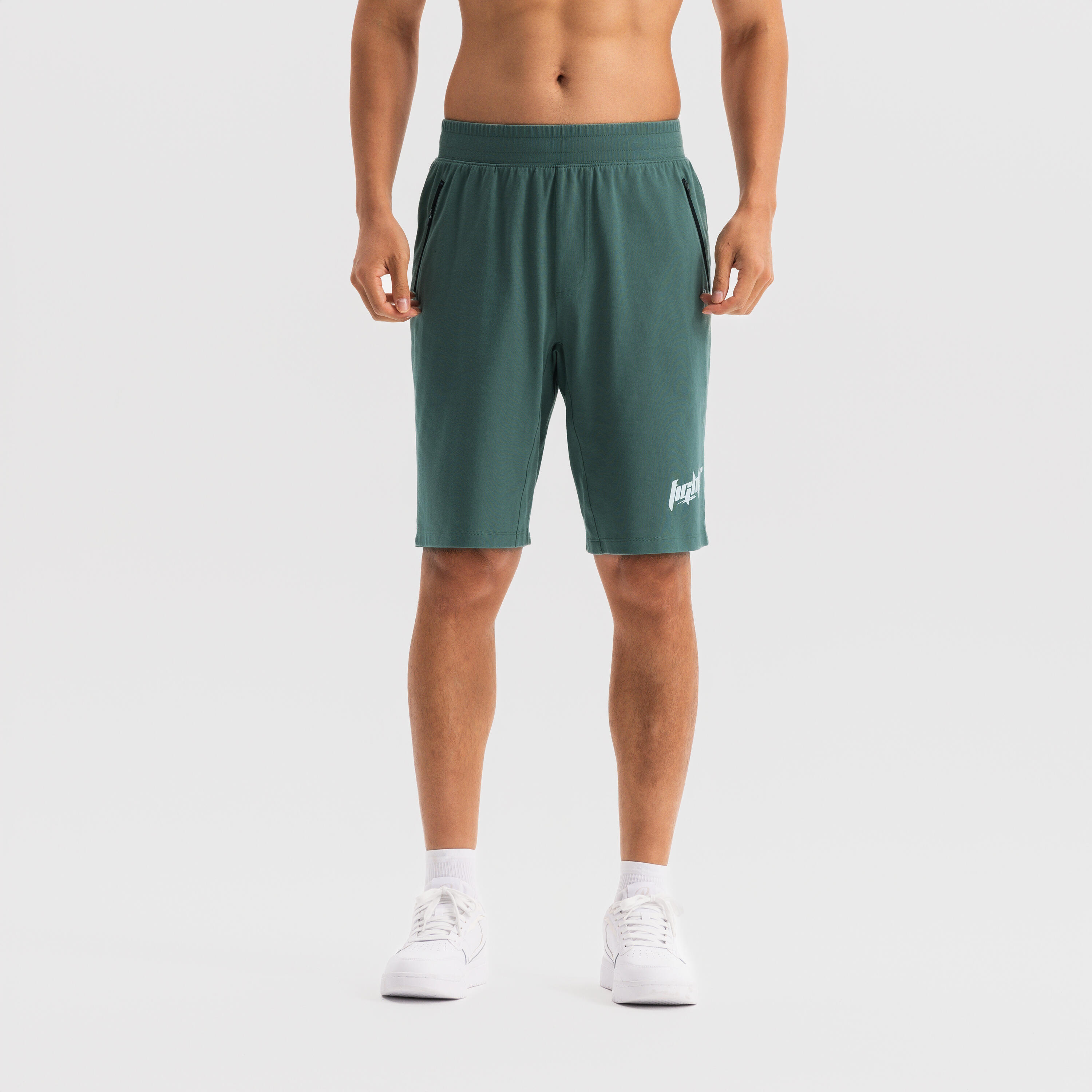 

Мужские базовые спортивные шорты с молнией Domyos