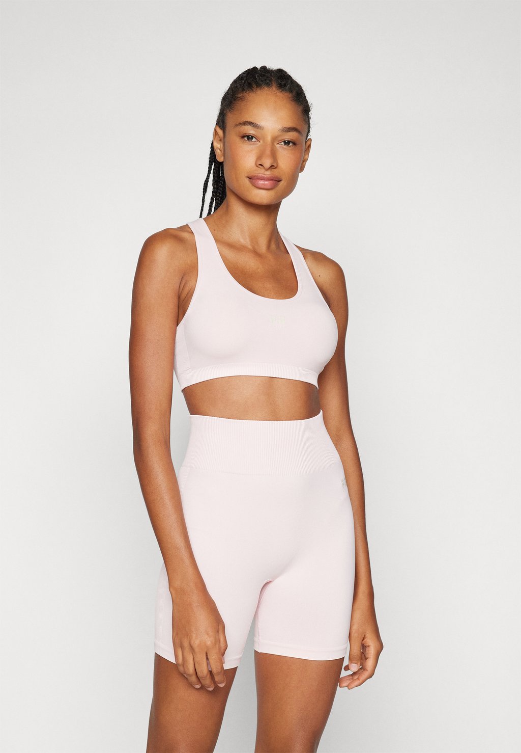 

Спортивный бюстгальтер с легкой поддержкой RESTORE SEAMLESS BRA P.E Nation, светло-розовый