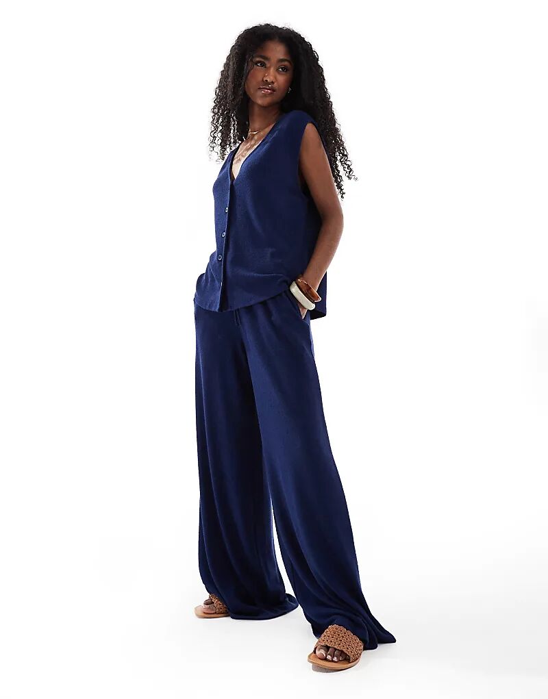 

Широкие брюки из текстурированного трикотажа ASOS DESIGN темно-синего цвета