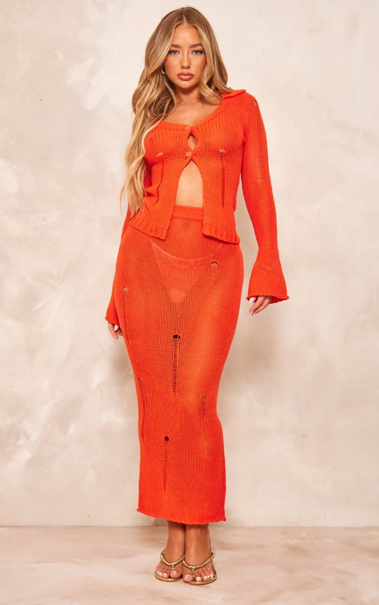 

PrettyLittleThing Коралловая трикотажная длинная юбка с эффектом потертости