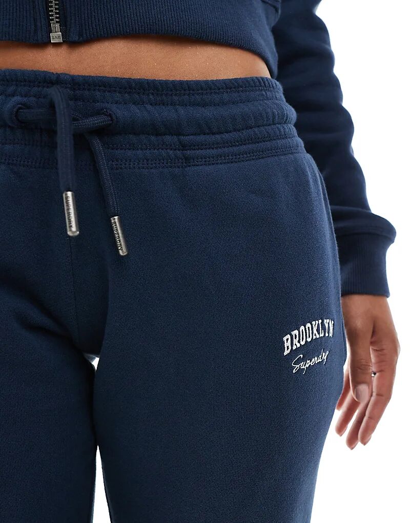 Спортивные брюки-клеш Superdry Athletic essentials с низкой посадкой в насыщенном темно-синем цвете — фото 3