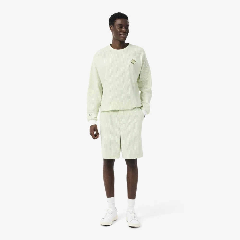 Мужские гольф-шорты из сирсакера жёлто-зелёные от Lacoste