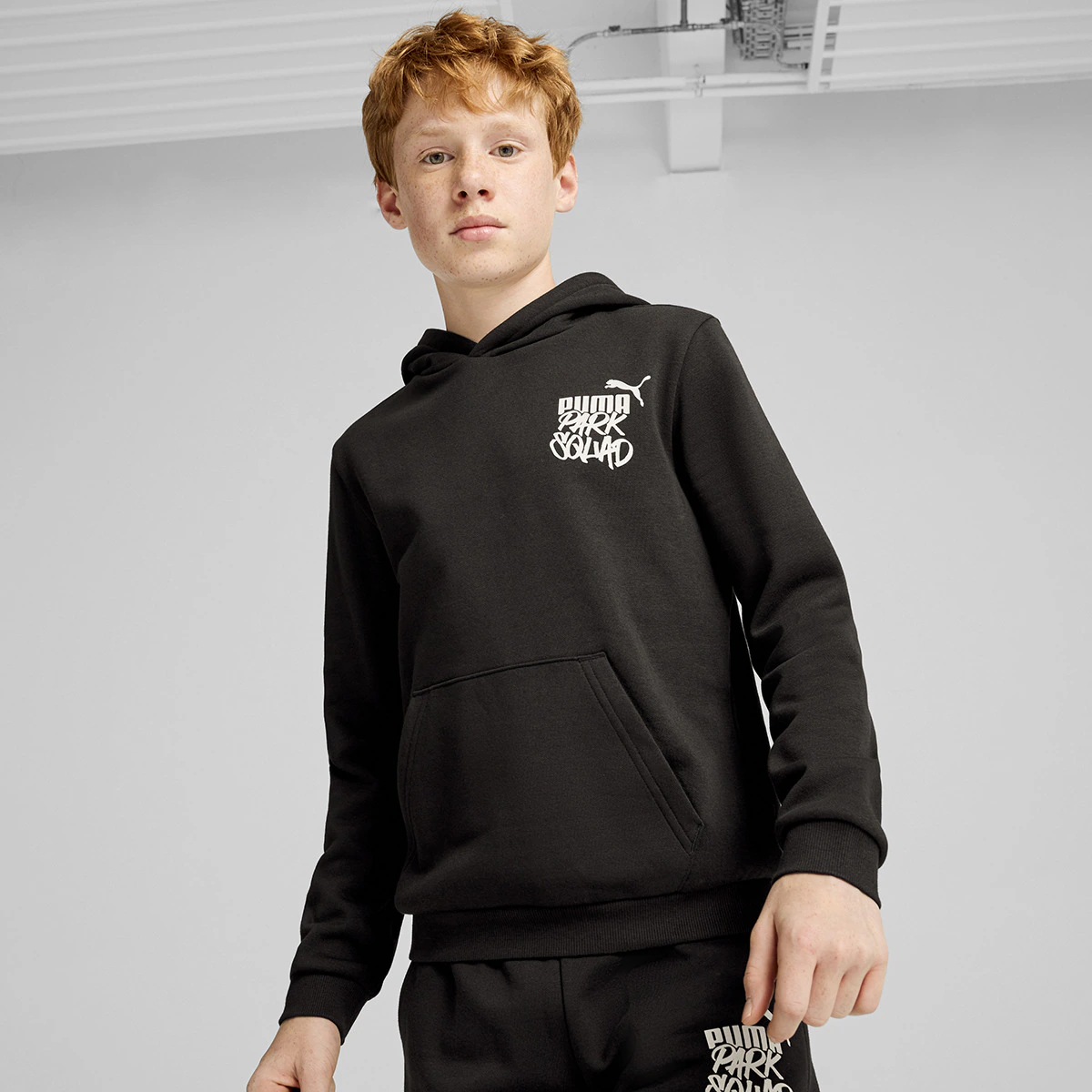 

Детская толстовка ess+ MID 90s Hoodie FL B Puma, чёрный