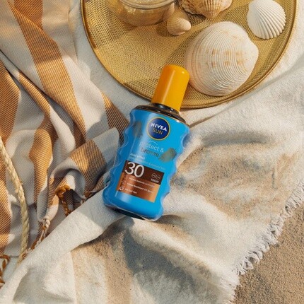Nivea Солнцезащитное и активирующее бронзовый загар защитное масло Spf30 200 мл — фото 3