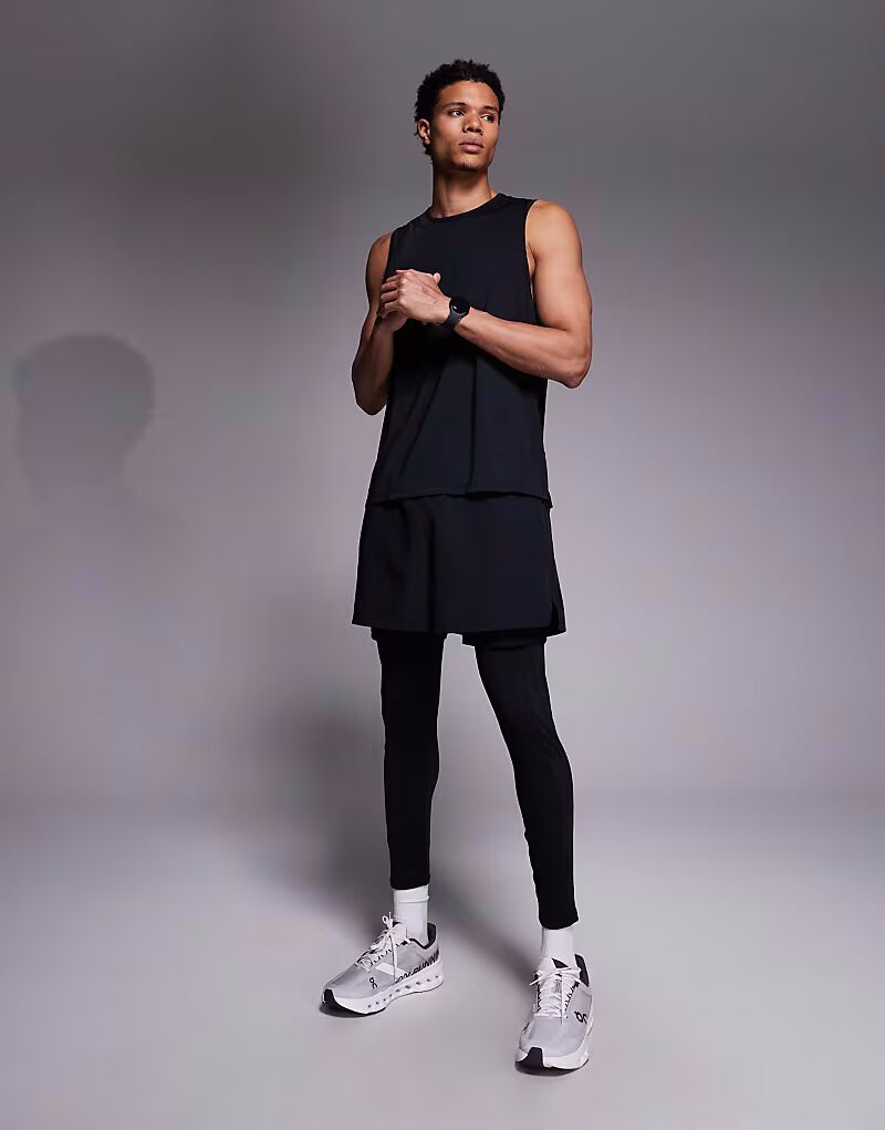 

Светоотражающие быстросохнущие леггинсы для бега с карманом для энергетического геля черного цвета 4505