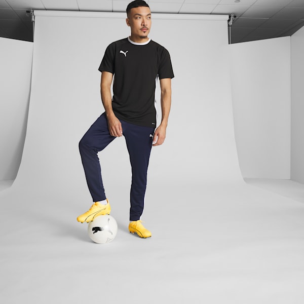 Мужские футбольные бутсы для игры на твердом/искусственном грунте Ultra Ultimate Puma, желтый — фото 2