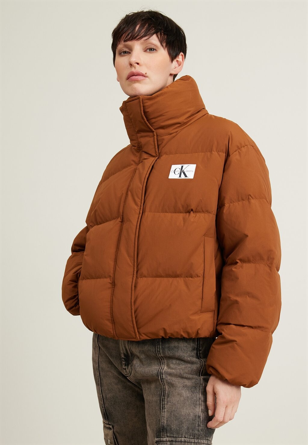 

Пуховик Soft Touch Label Calvin Klein Jeans, цвет fudge brown