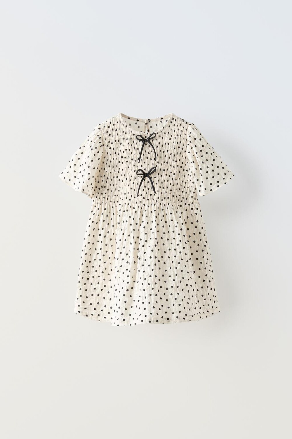 

Платье в текстурный горошек с бантами ZARA, экрю