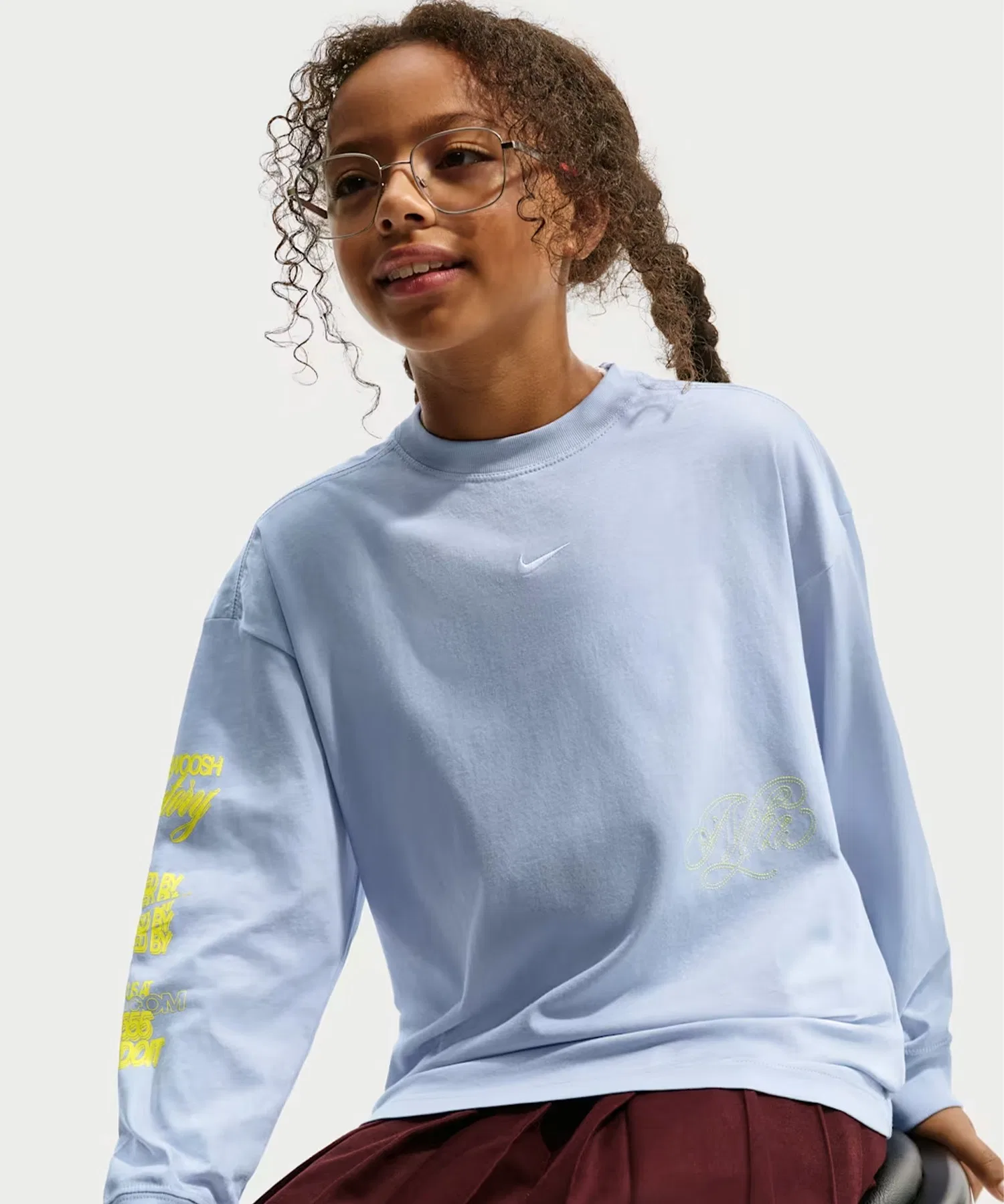 Детская футболка с длинным рукавом Nike G NSW TEE LS GFX OS серая — фото 4