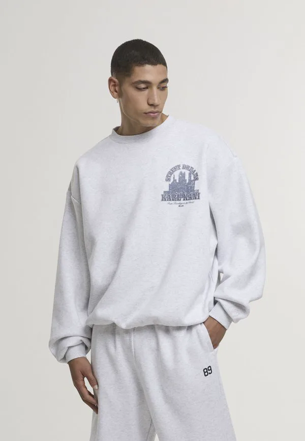 

Толстовка с эмблемой команды Karl Kani, Grey Melange, Серый, Толстовка с эмблемой команды Karl Kani, Grey Melange