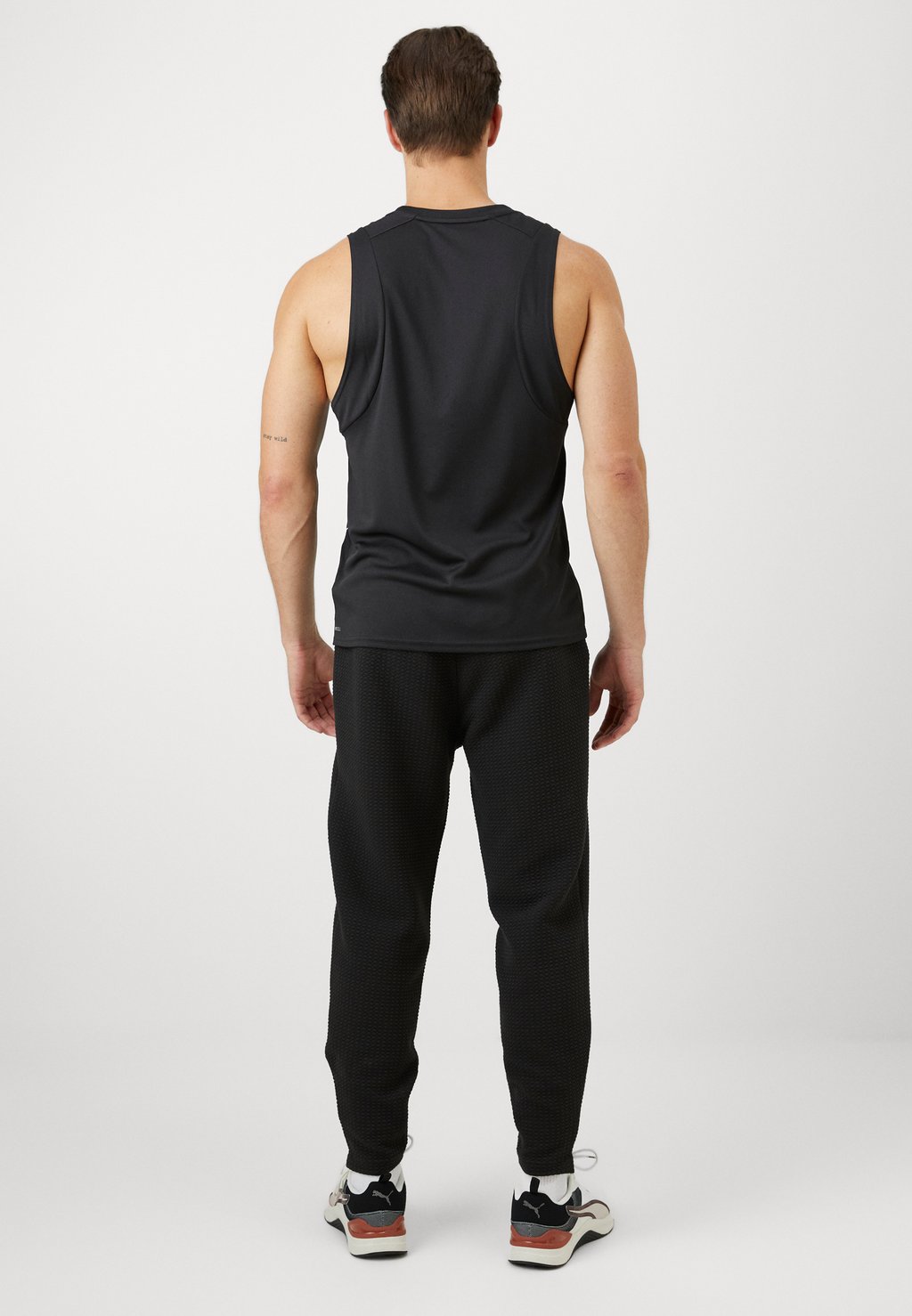 

Спортивные брюки STUDIO TEXTURE PANT Puma, черный