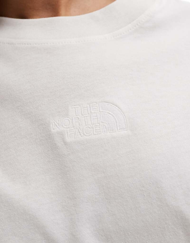 

Белая футболка оверсайз The North Face Evolution