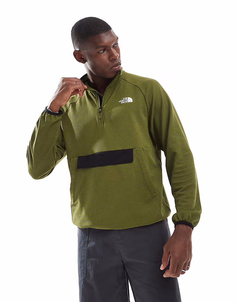 

Анорак The North Face Kecha 1/4 цвета хаки, складывается в молнию.