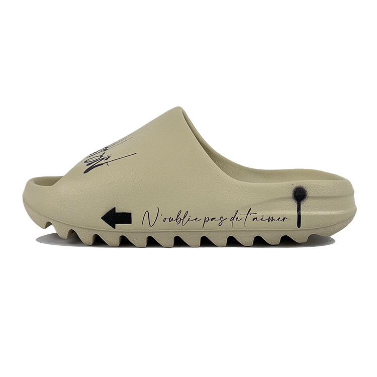 Шлепанцы Yeezy Slide унисекс бежевый/черный Adidas Originals