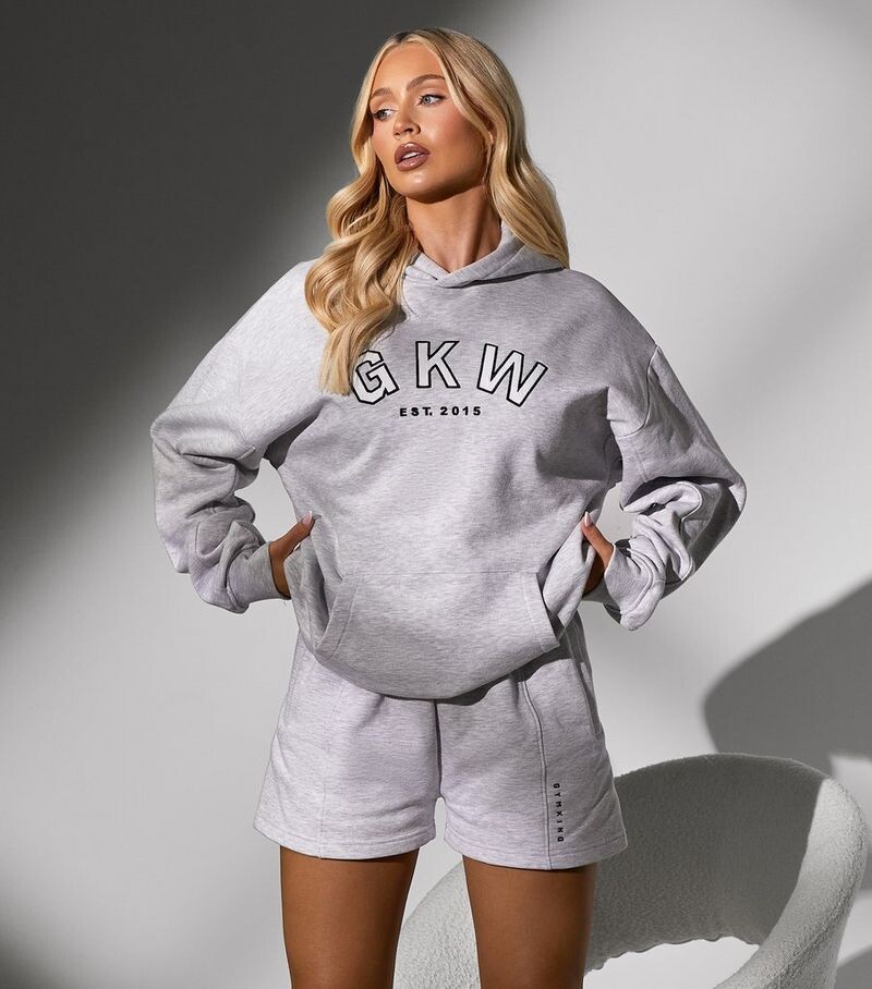 

Серая толстовка свободного кроя с логотипом Gym King Gym King, бледно-серый