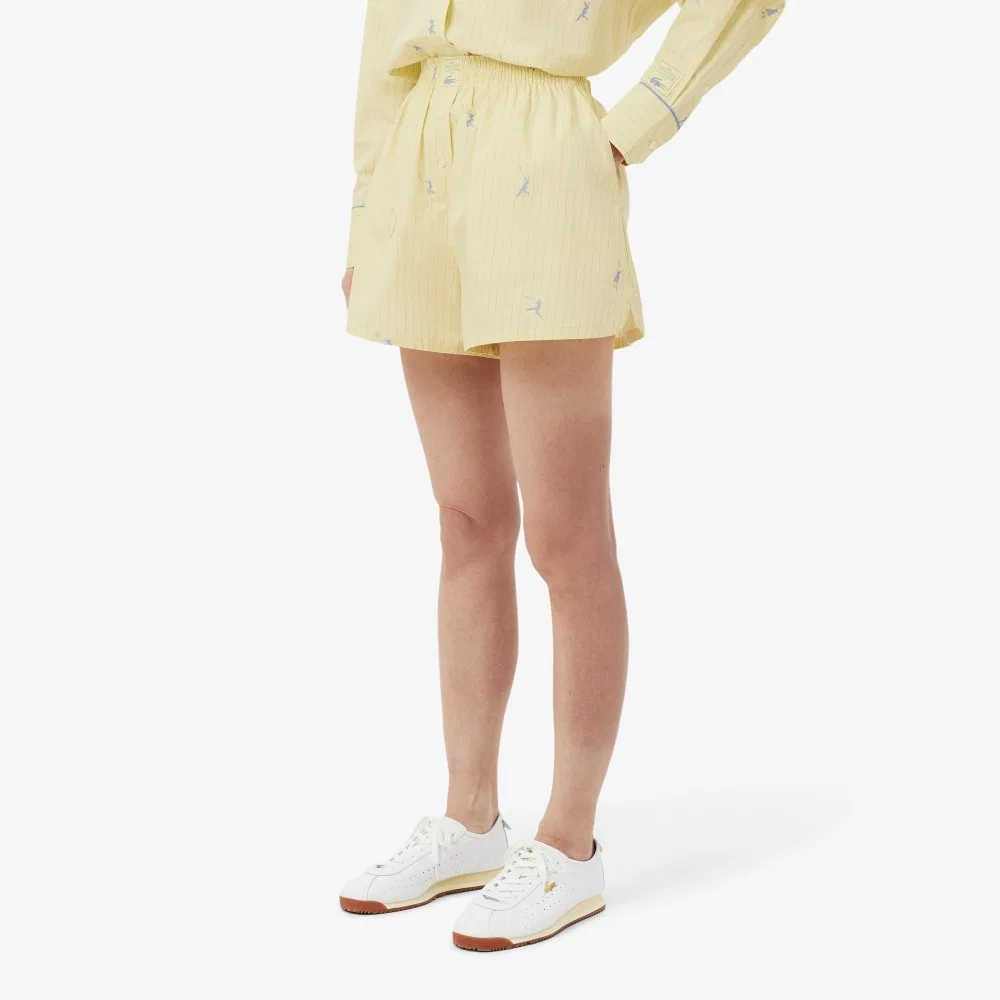 Шорты Lacoste в полоску с вышивкой, желтые — фото 2