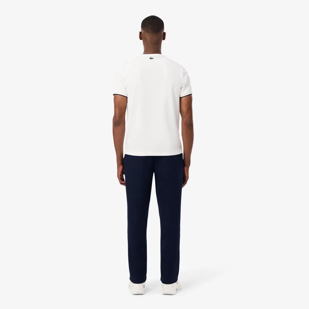 Мужские теннисные брюки Heritage тёмно-синие от Lacoste — фото 3
