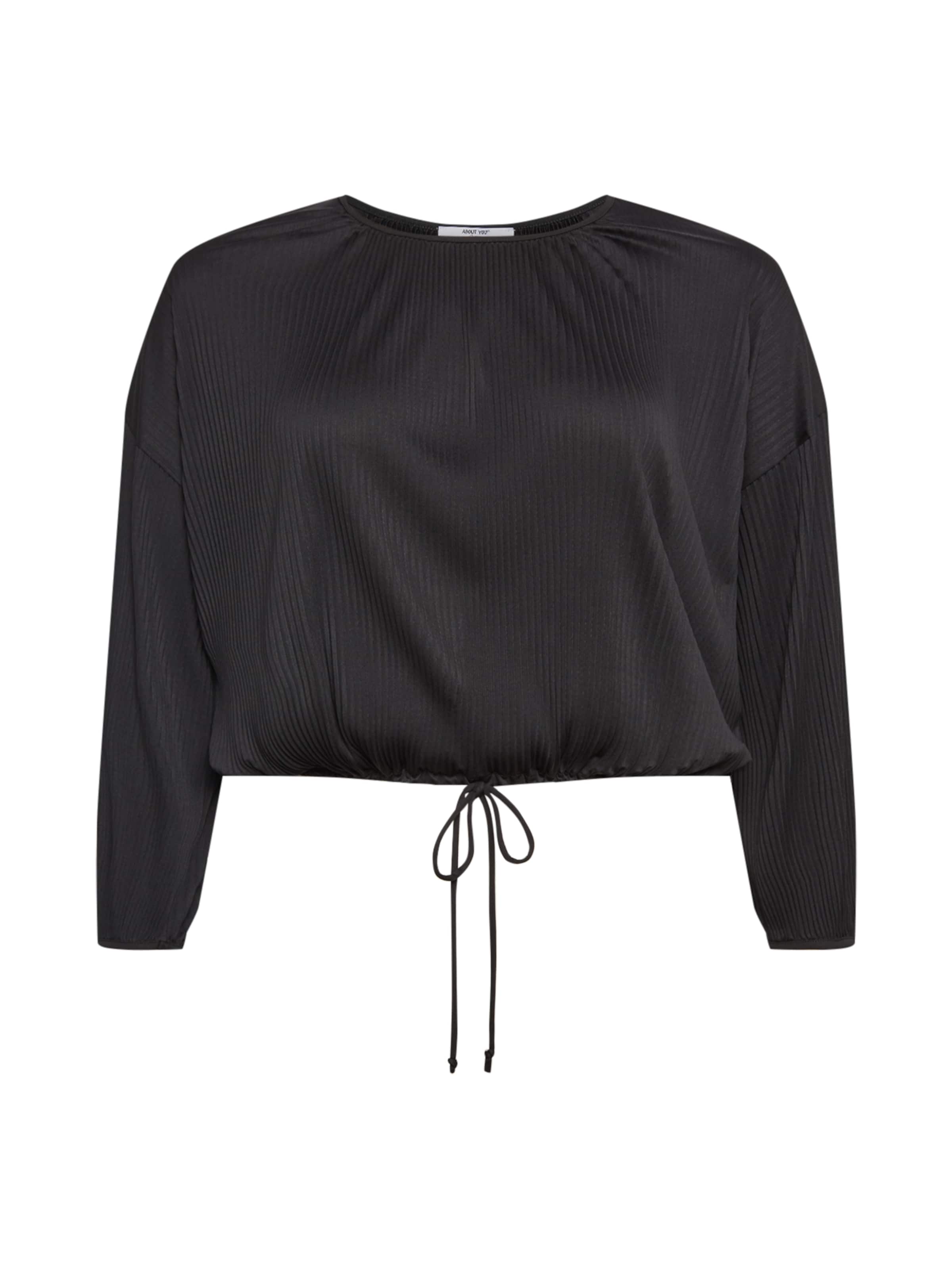 

ABOUT YOU Curvy Футболка 'Tia' в черном цвете