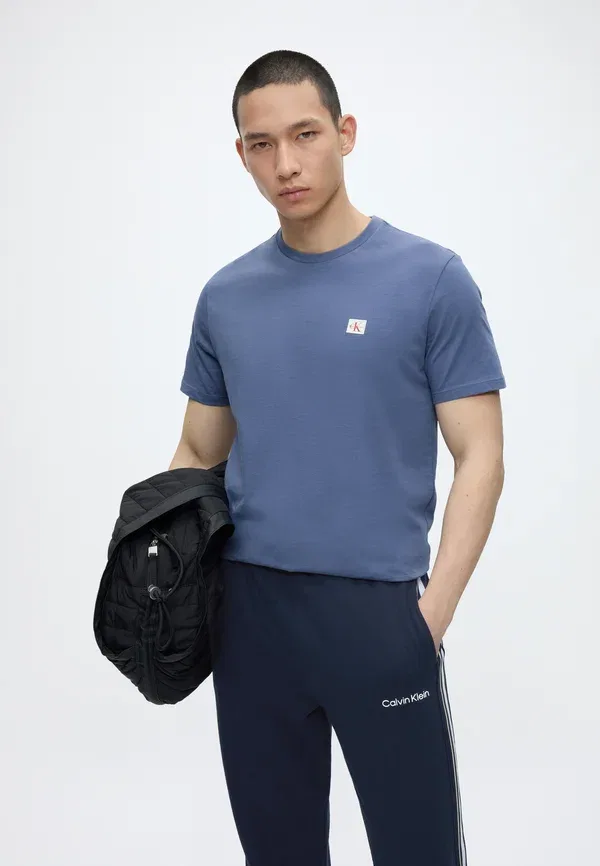 Штаны спортивные Calvin Klein Logo Pant Icon, цвет береговой линии — фото 4