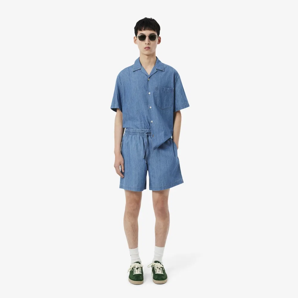 Мужские джинсовые шорты свободного кроя светло-синие от Lacoste