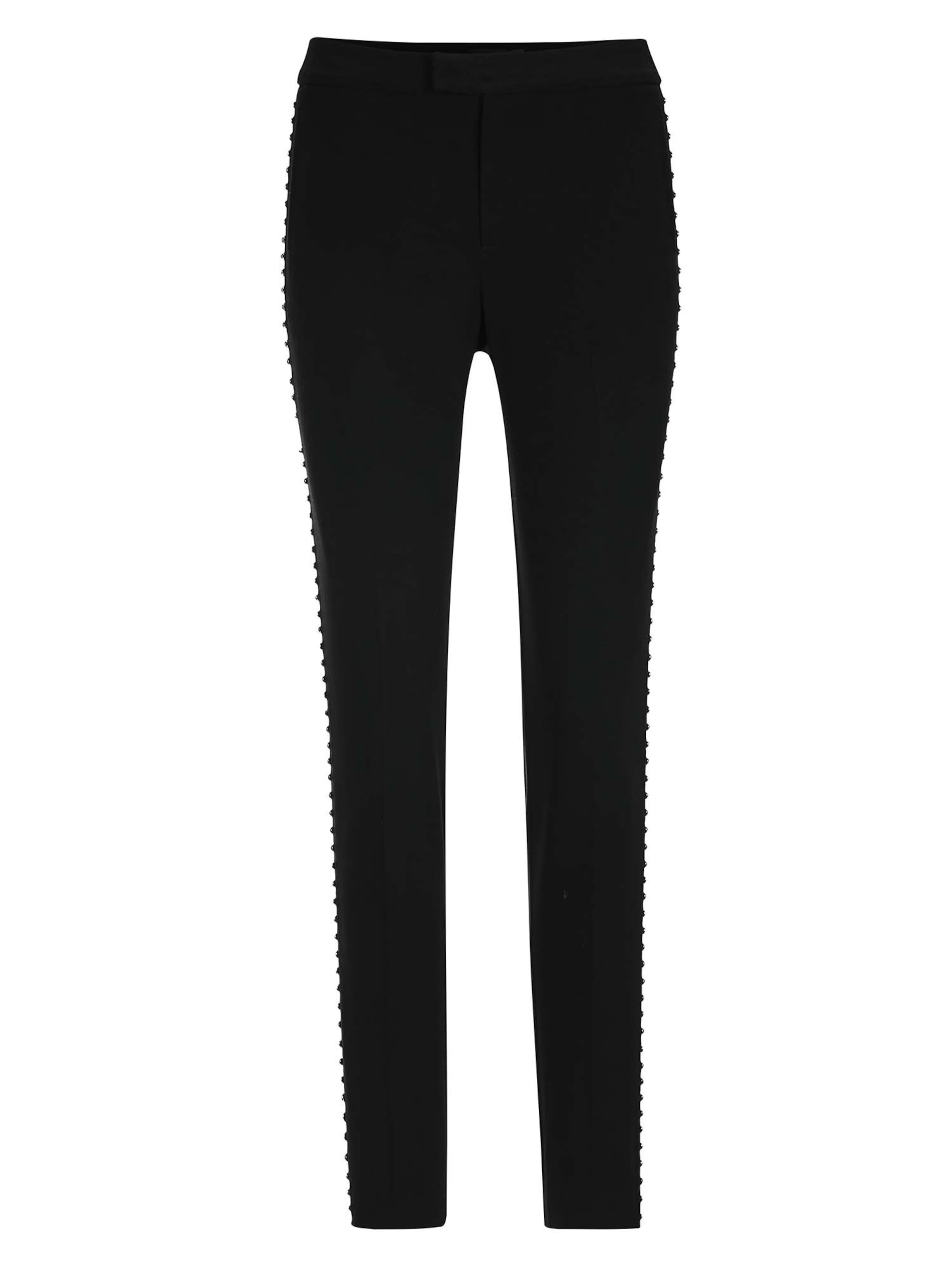 

MADELEINE Брюки с зауженным низом в черном цвете