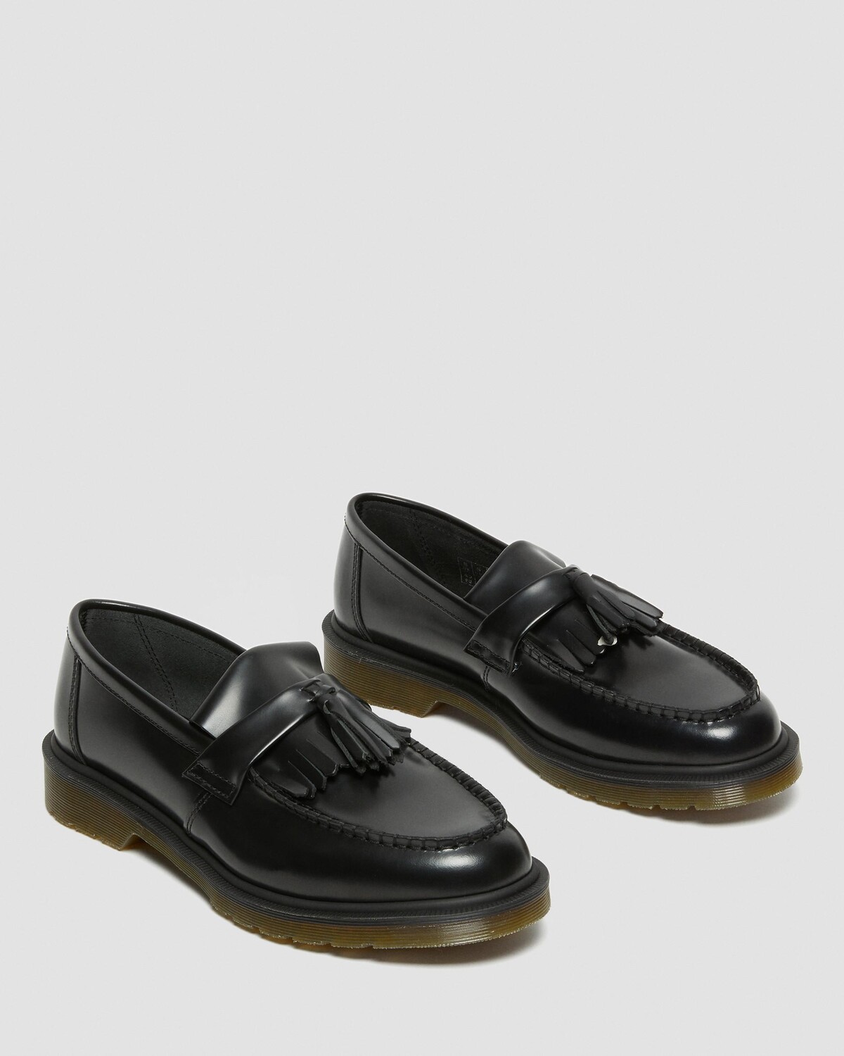 

Гладкие кожаные лоферы Adrian с кисточками Dr. Martens