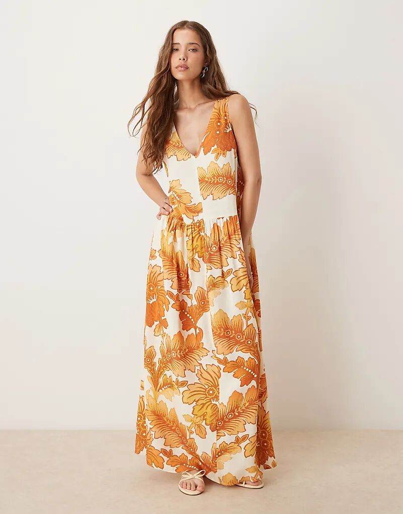 

Платье макси ASOS DESIGN с заниженной талией, воротником-халтер и вуалью, с оранжевым принтом