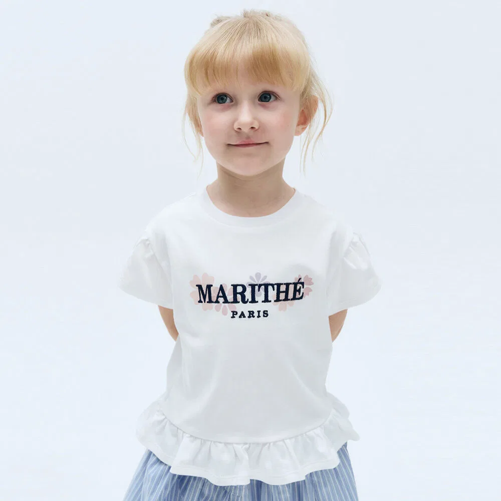 Детская футболка с рукавами-фонариками и баской белая от Marithé Kids