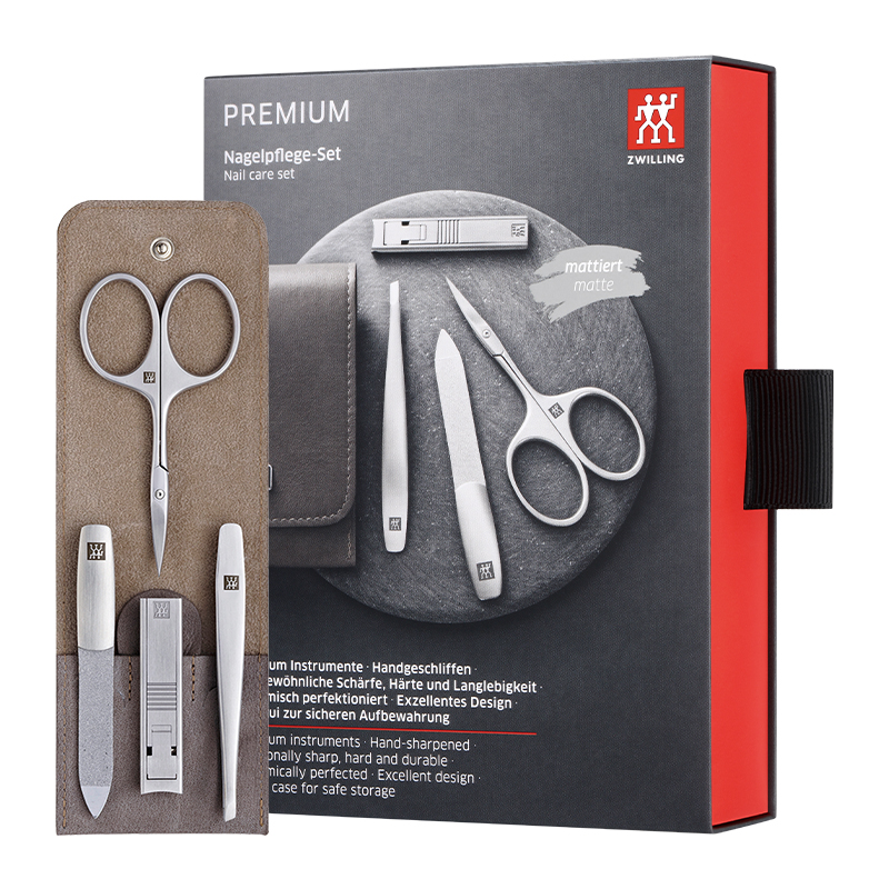 

Набор из четырех предметов для ухода за ногтями: щипчики, пилочка, пушер и зажим ZWILLING