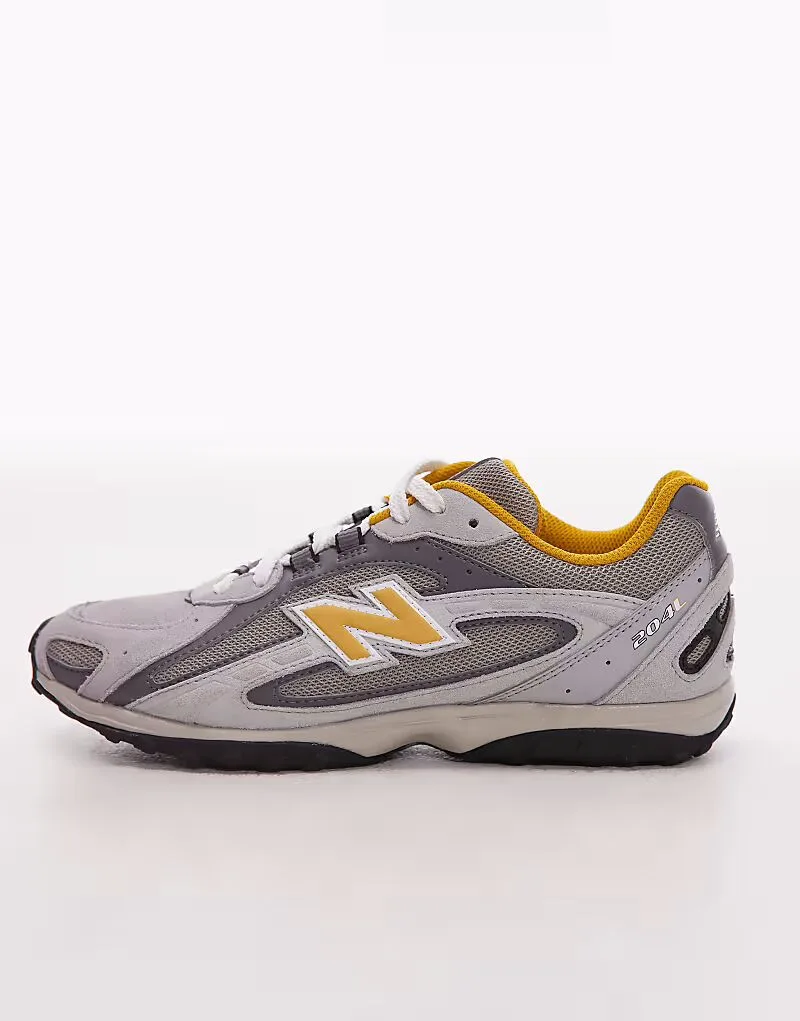 Унисекс кроссовки New Balance 204L из серой и желтой замши — фото 2