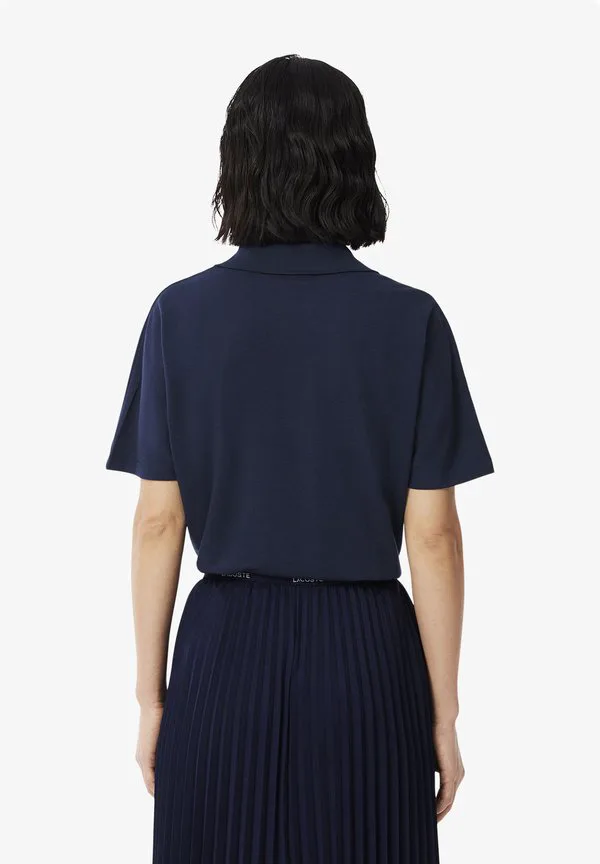 Рубашка-поло Lacoste Bleu Nuit, однотонная, дышащая — фото 3