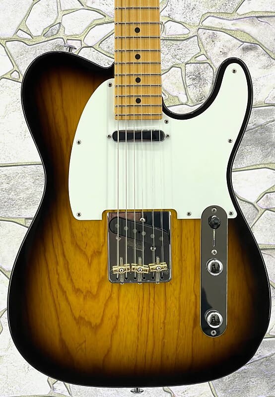 

Электрогитара Suhr Classic T in 2 Tone Tobacco Burst with a Swamp Ash Body Maple Neck and SS &SSCI Pickups Including a Hard Case
