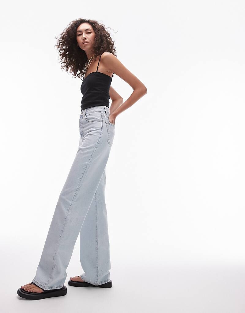 

Отбеленные джинсы Topshop со средней высокой талией
