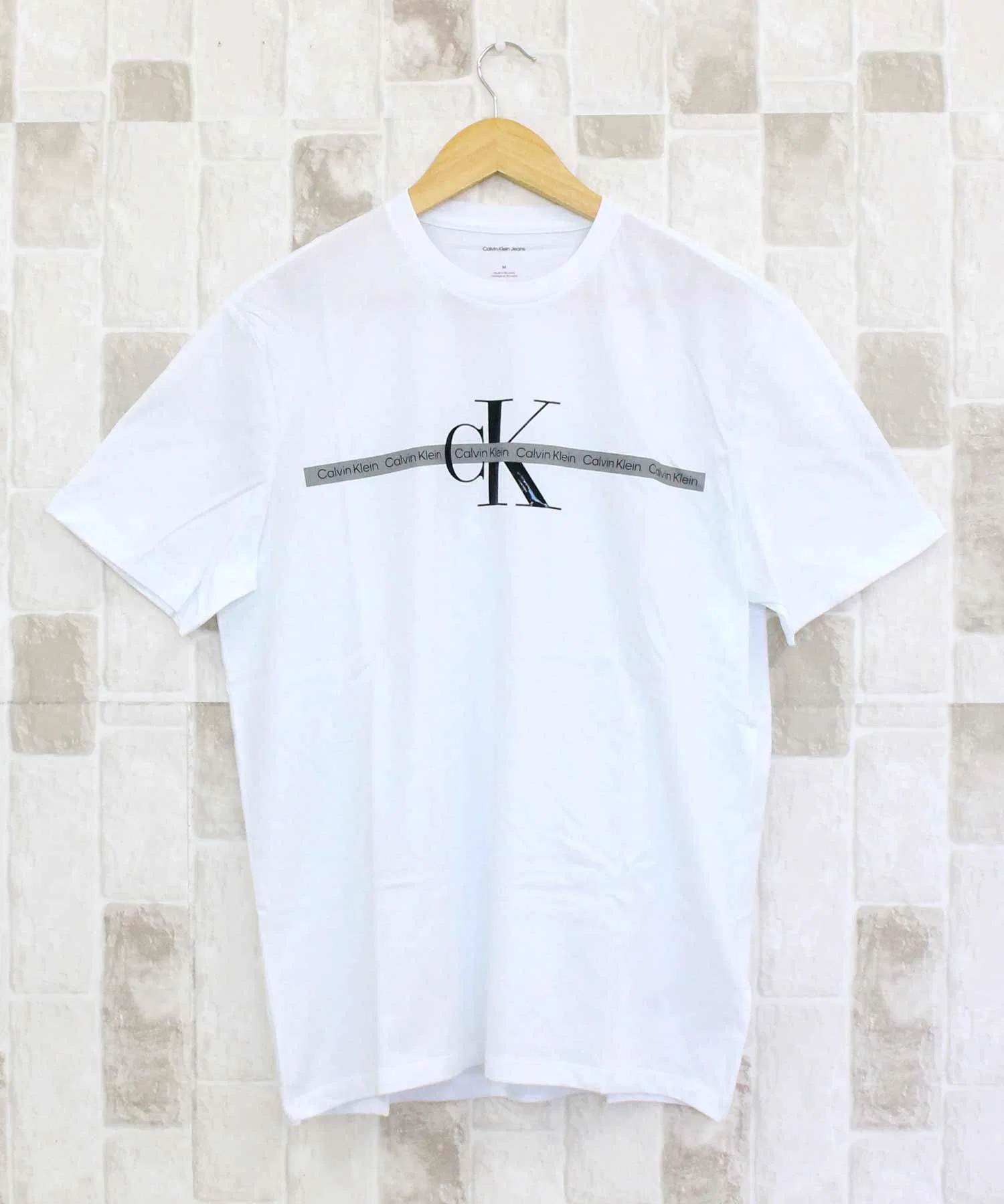 Мужская и женская футболка Calvin Klein Jeans CKJ TAPE REPEAT LAYERED LOGO CREW NECK TEE — фото 2