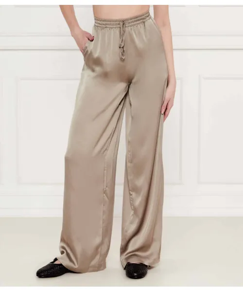 

Атласные брюки Инес Flare fit Guess Jeans, зеленый