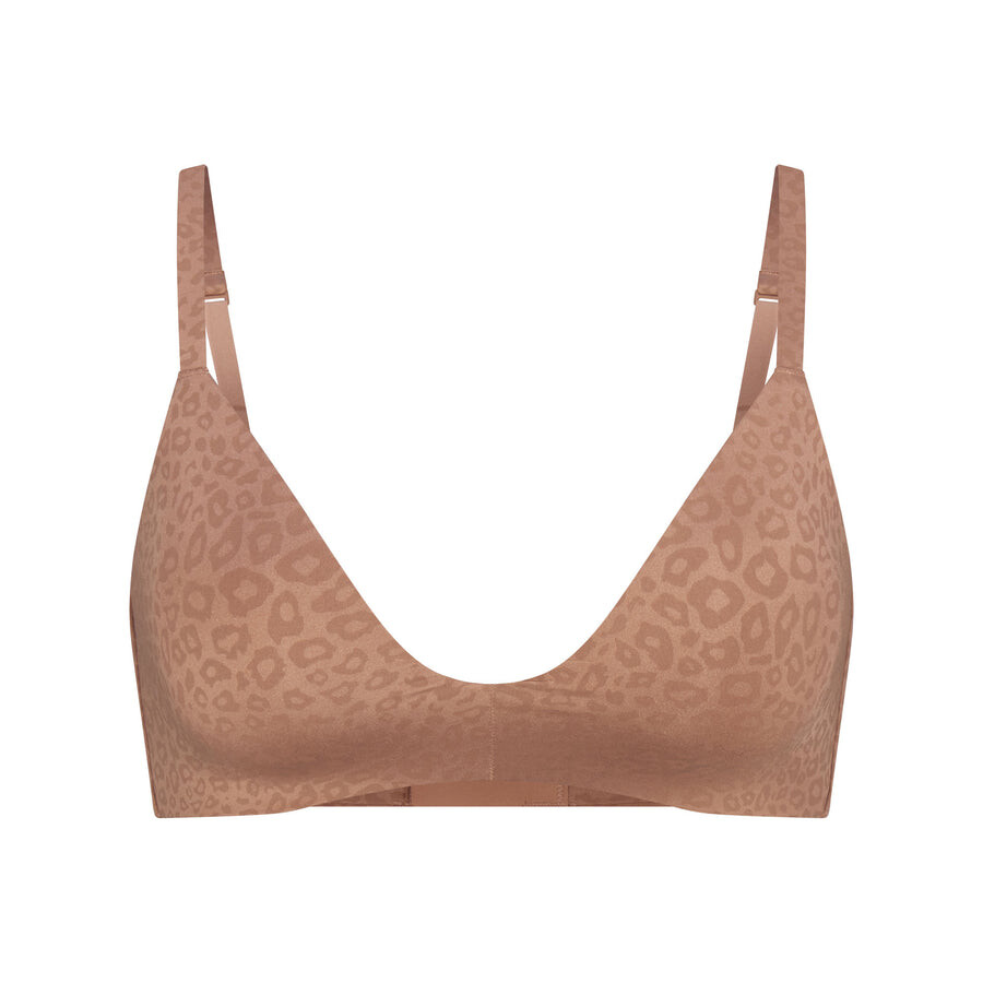 

Деми бра SKIMS Wireless Form, цвет Sienna Micro Leopard Print