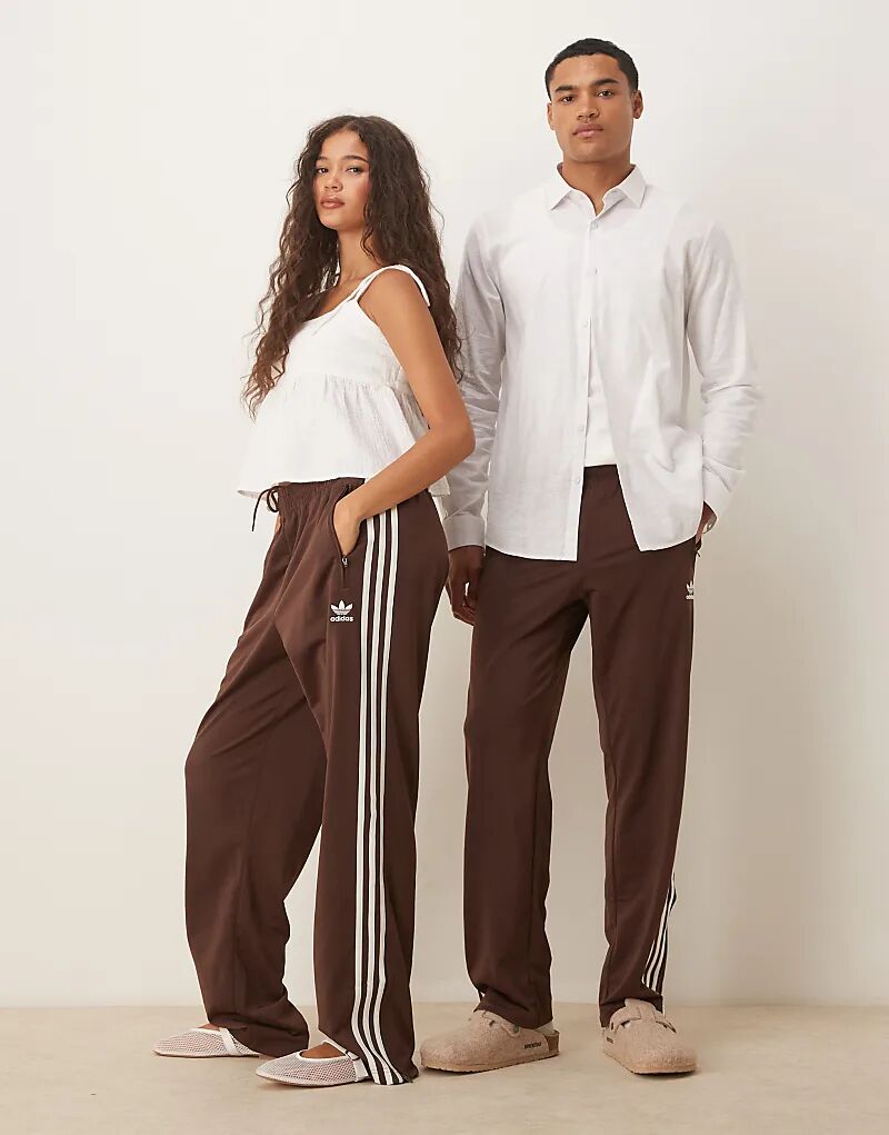 

Спортивные брюки adidas Originals Firebird коричневого цвета