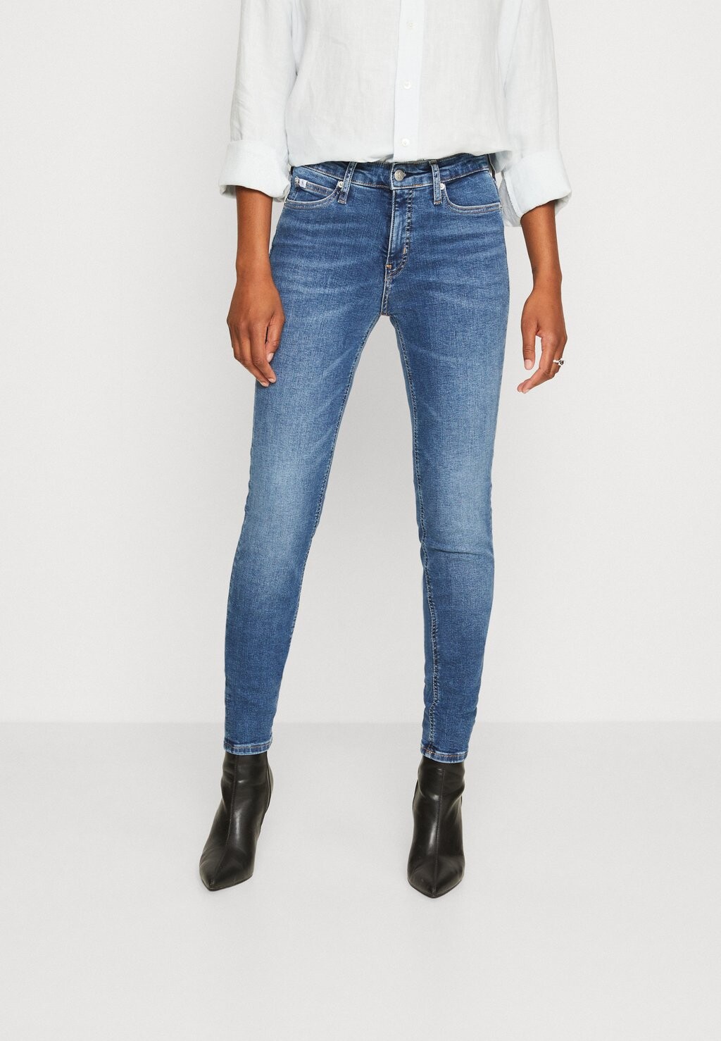 

Джинсы Skinny Fit MID RISE Calvin Klein Jeans, темный деним